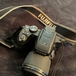Fujifilm Black Digital Camera with Lens Cap